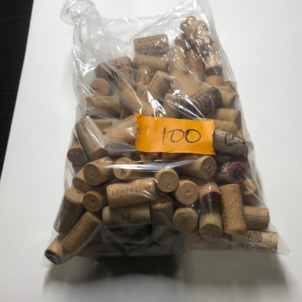 100 various wine corks